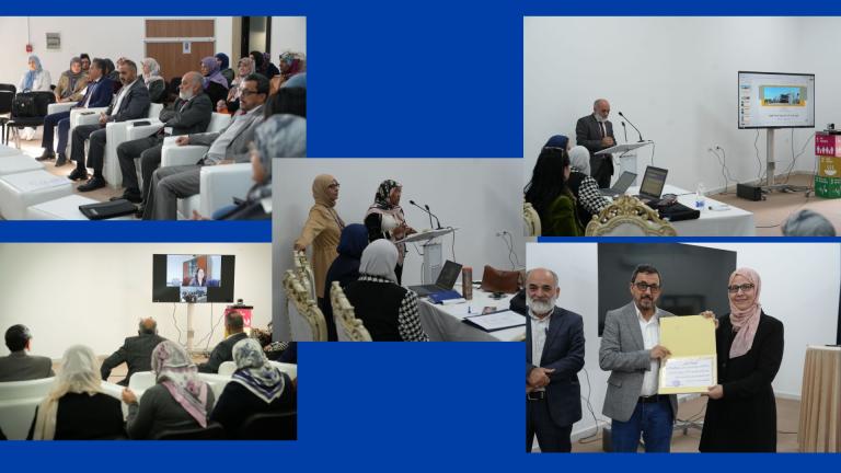 A conference with multiple speakers and attendees in formal attire. Presentation slides are displayed on screens. People are seated and a certificate is being awarded.