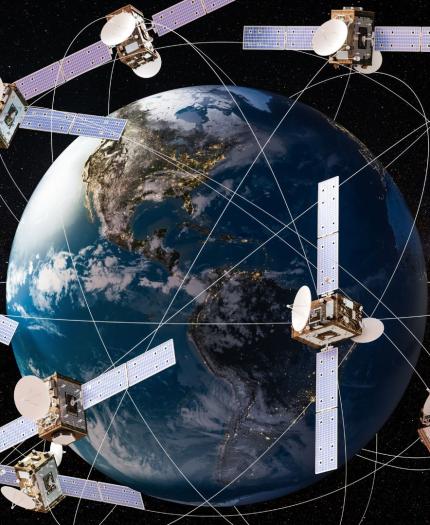 Illustration of Earth surrounded by seven satellites with solar panels, connected by lines, set against a space background with stars and a distant view of the Moon.