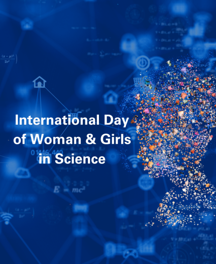 Silhouette of a woman filled with colorful particles against a blue background with text: "International Day of Woman & Girls in Science.